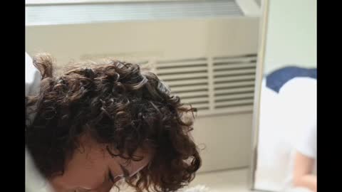 Vertical Video of a Woman Kissing a Cat on the Floor#cat990 #cat #shorts