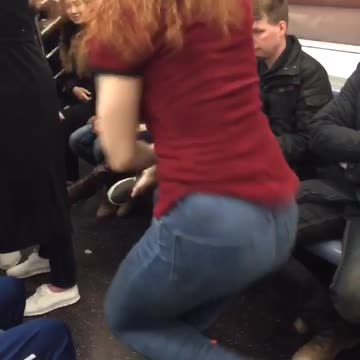 Man in black beat boxes on subway platform