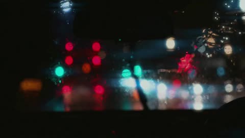 Watching the rain thought a car windshield