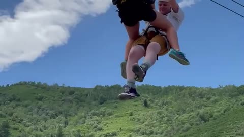 Spider-Girl Saves Man Stuck on Zipline