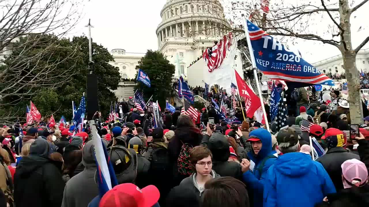 Patriots Unfurl US Flag