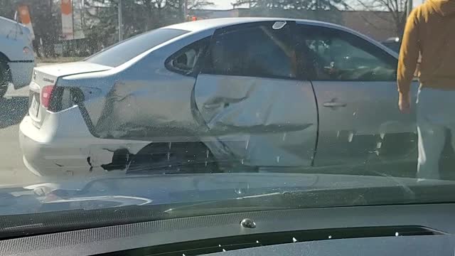 Car hit by transit bus