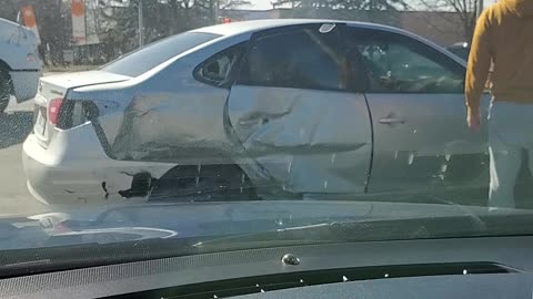 Car hit by transit bus