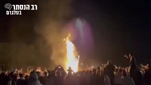 תיעוד מהדלקת ל"ג בעומר של הינוקא ביער צרעה, דמות מסתורית נצפתה יוצאת מתוך האש | רב הנסתר בטלגרם