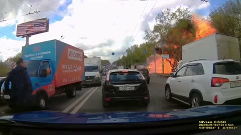 truck explodes after hitting a car.