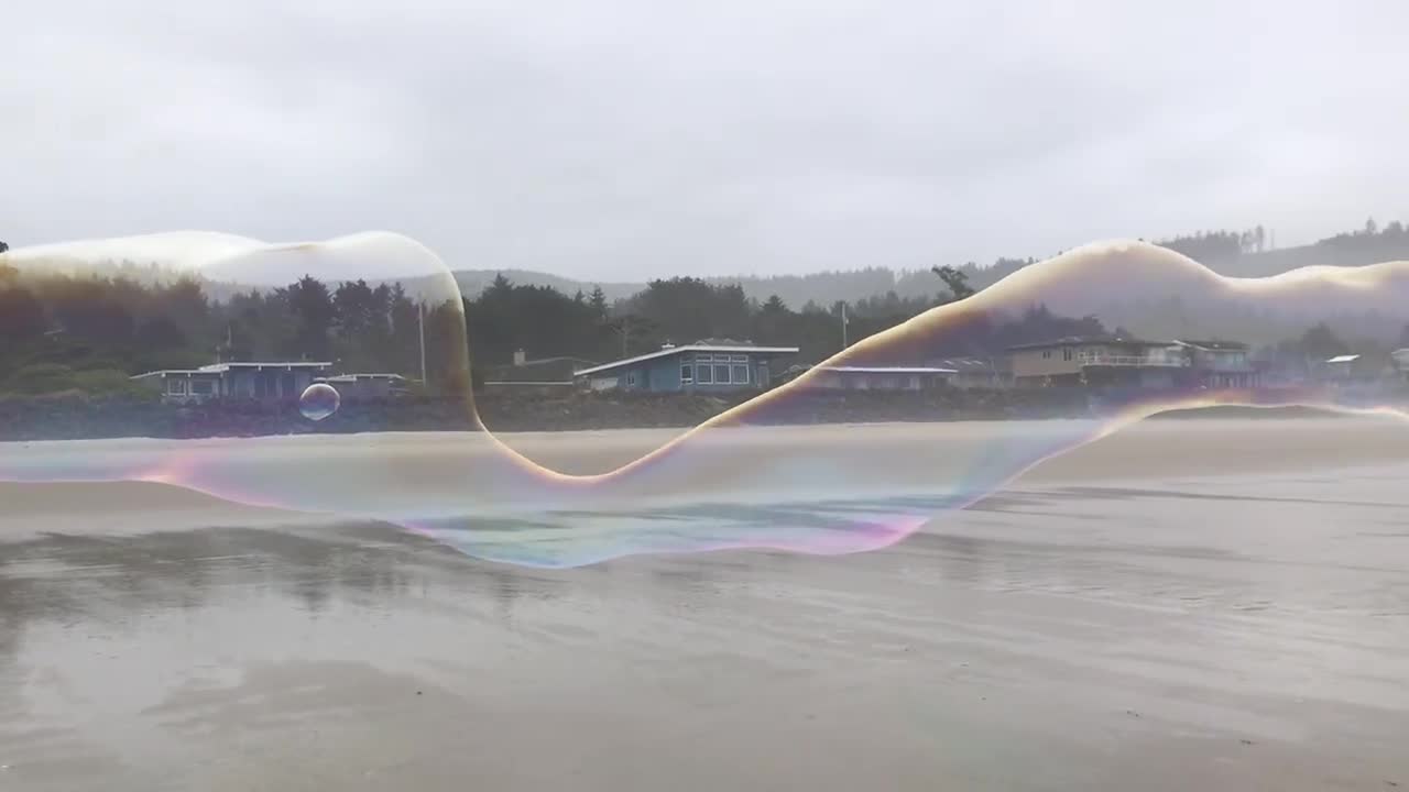 Incredible Giant Bubble Stretches Along Beach