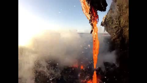 very rare lava falling in water