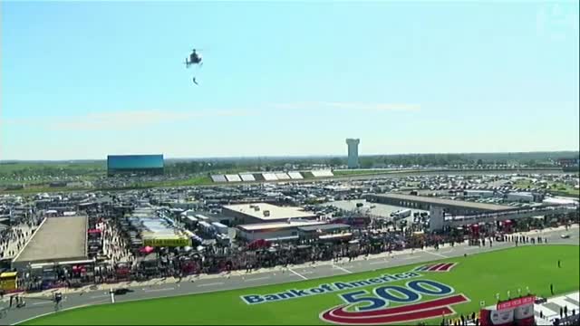 Daring aerial acrobatics suspended from a helicopter