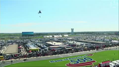 Daring aerial acrobatics suspended from a helicopter