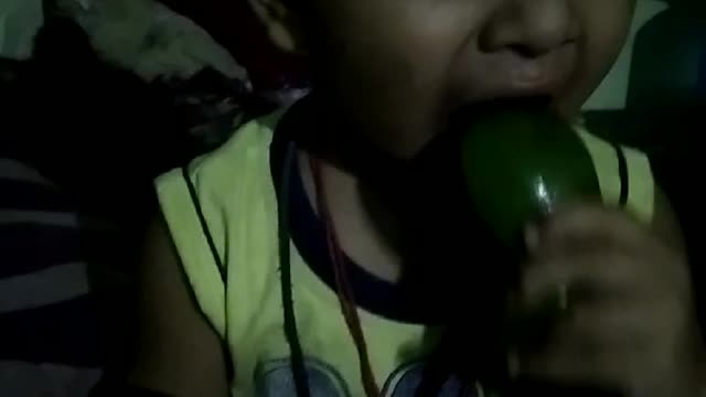 Little champ eating mango first time