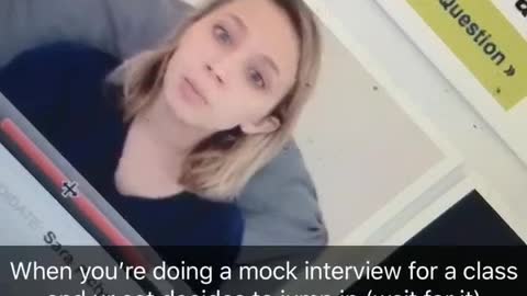 Girl records herself on laptop doing recorded interview and cat jumps into shot