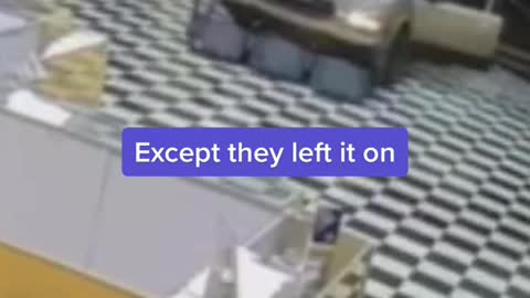 Burglars crash car through storefront