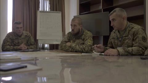 US and Canadian military officers meet uniformed members of the neo-Nazi Azov