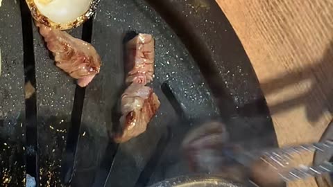 Video of cutting beef with scissors