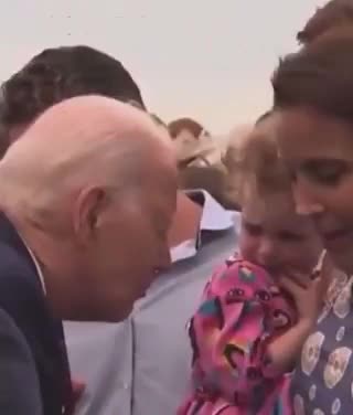 Parents serving their little kid to Biden