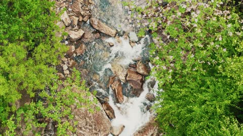 OMG!! Watch this Amazing Drone footage of river with big rocks