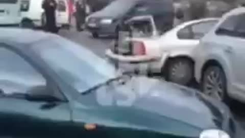 Ukrainian military run and crush civilian vehicles with equipment
