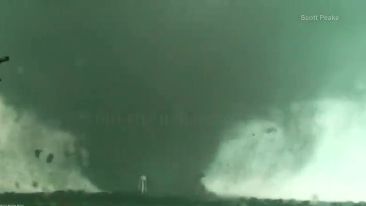 tornado hitting highway destroying house
