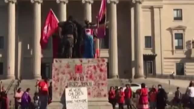 [Queen Victoria and Elizabeth II statues toppled] • Queen Elizabeth Statue • Queen Victoria Statue