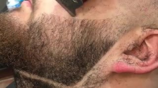 Epic beard transformation by talented barber