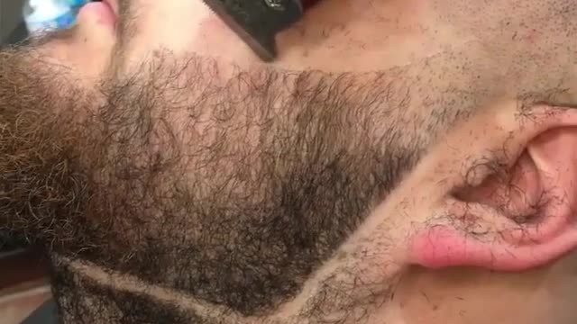 Epic beard transformation by talented barber