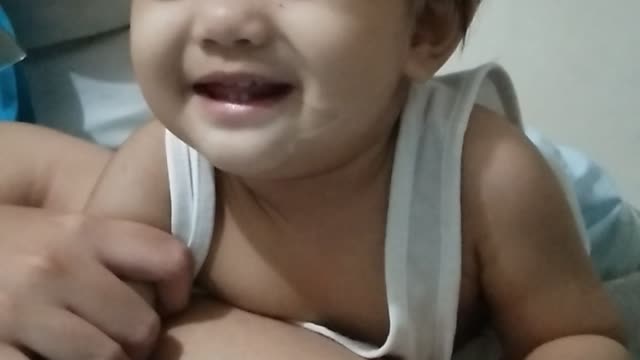 my baby keep on smiling, so adorable!
