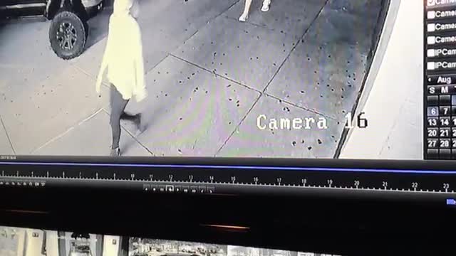 Guy piggybacking girl on security cam falls