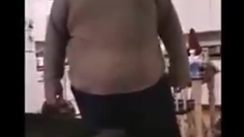 Thanks to the covid shot this man has no control over his body, face or voice.