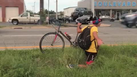 Man Rides His Bike the Hard Way