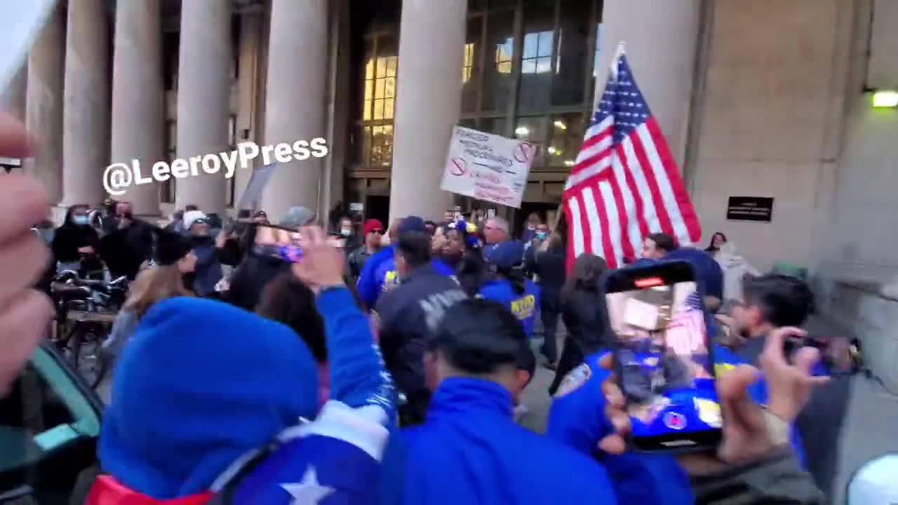 NYC Mayor-elect Eric Adams confronted by mandate protesters