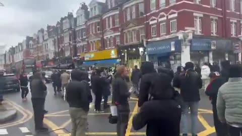 Gangs of masked Kurdish men take over the streets of North London in support