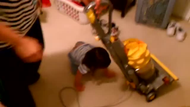 Toddler Has Adorable Tantrum When Her Parents Put The Vacuum Away