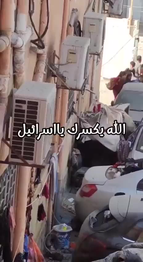 Palestinians tried to leave a hospital in Gaza, with white flags raised ​