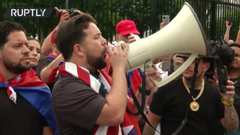 Protesters gather in front of the White House demanding US intervention in Cuba