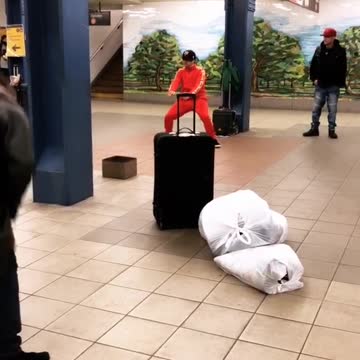Two guys subway station dance off