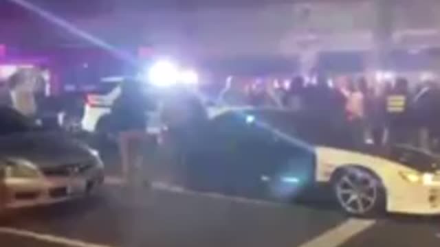 Tacoma Police officer runs over people to escape mob.