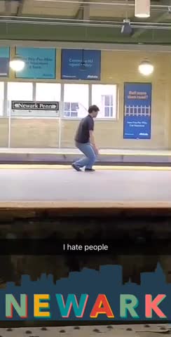 I hate people guy in black shirt blue jeans doing taichi in subway platform