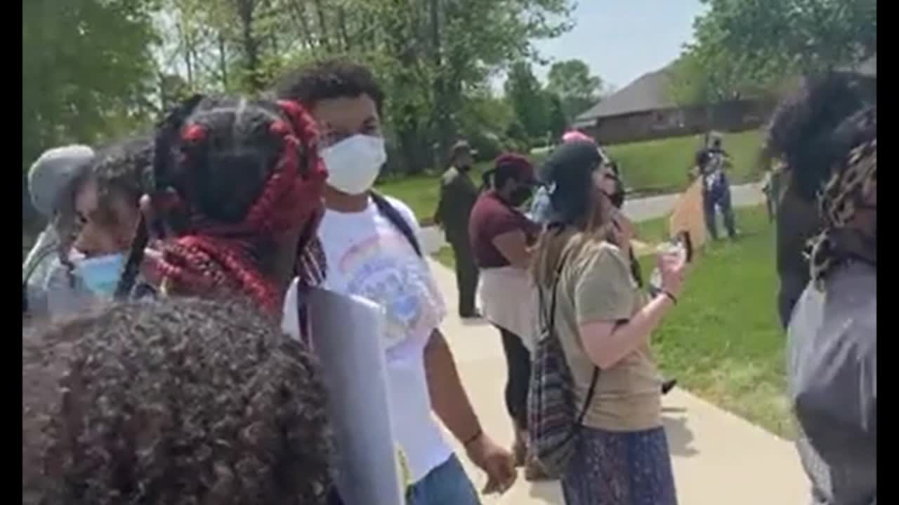 Marion (IL) activists rally to get a track coach fired