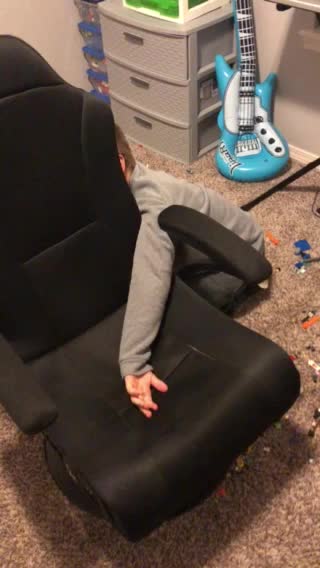 Grandson stuck in chair