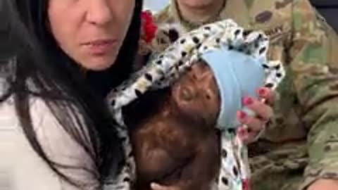 When he looks at the baby...
