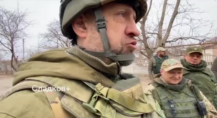 Captured Ukrainian soldiers working with DPR forces
