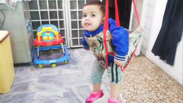 Cute Doll on swing