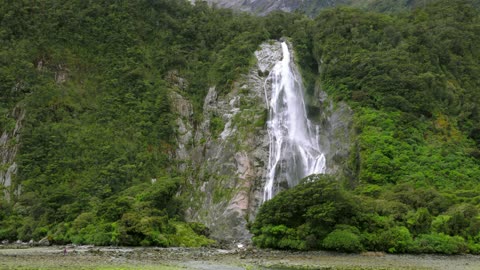 Waterfall in the middle of the forest is an extraordinary natural beauty