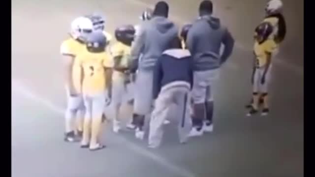 DISGUSTING - Youth football coach punches player, twice