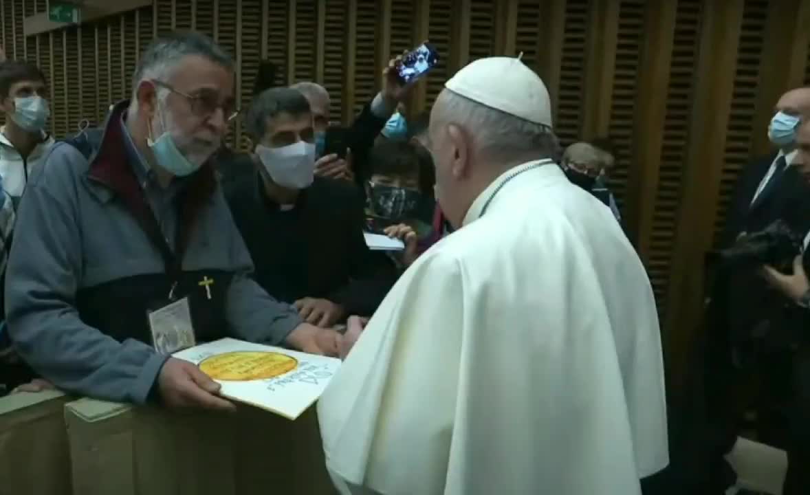 Maskless Marxist Pope