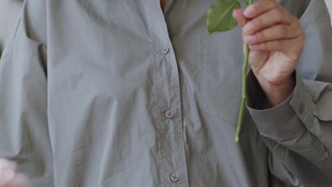 Pregnant Woman Assembling a Flower Arrangement