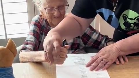 Elderly lady coerced into voting for Kamala Harris.