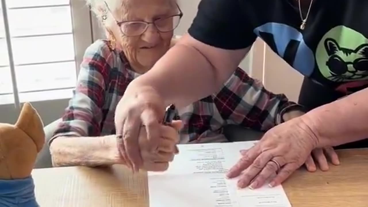 Elderly lady coerced into voting for Kamala Harris.