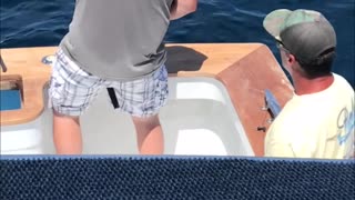 Fisherman Pulls His Friend's Fishing Pole To Make Him Believe He Has A Catch