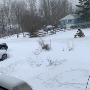 Snow fun on kids dirt bike